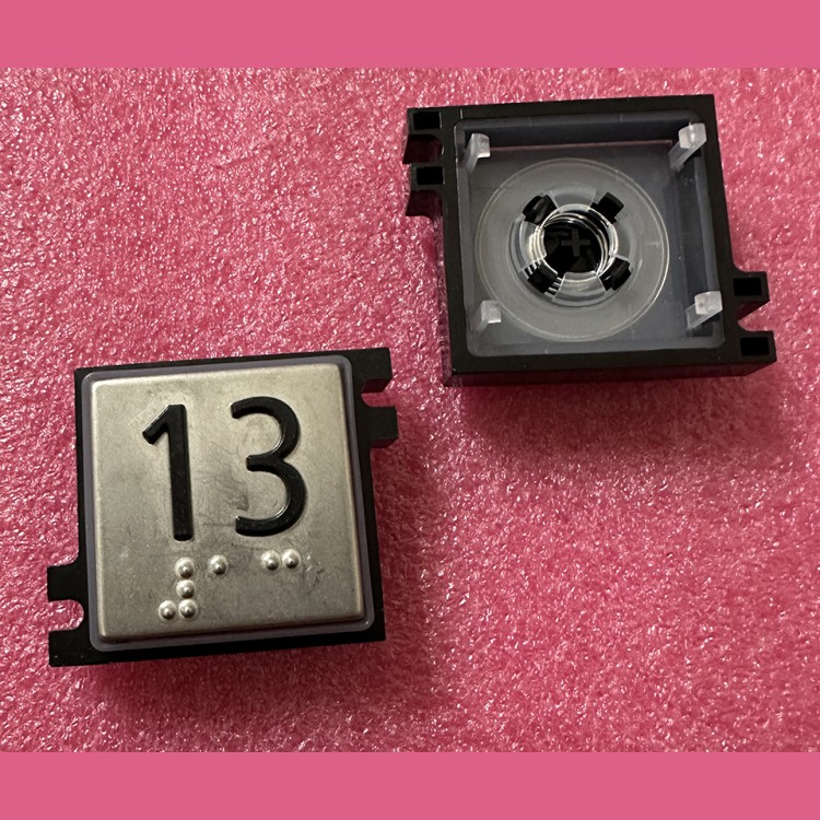 Толкатель кнопки с выдавленной надписью "13" шрифт Брайля Schindler